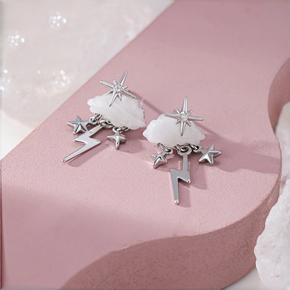 Cloud and star earrings close-up, silver star studs with mother-of-pearl cloud charms and dangling lightning bolt and star charms