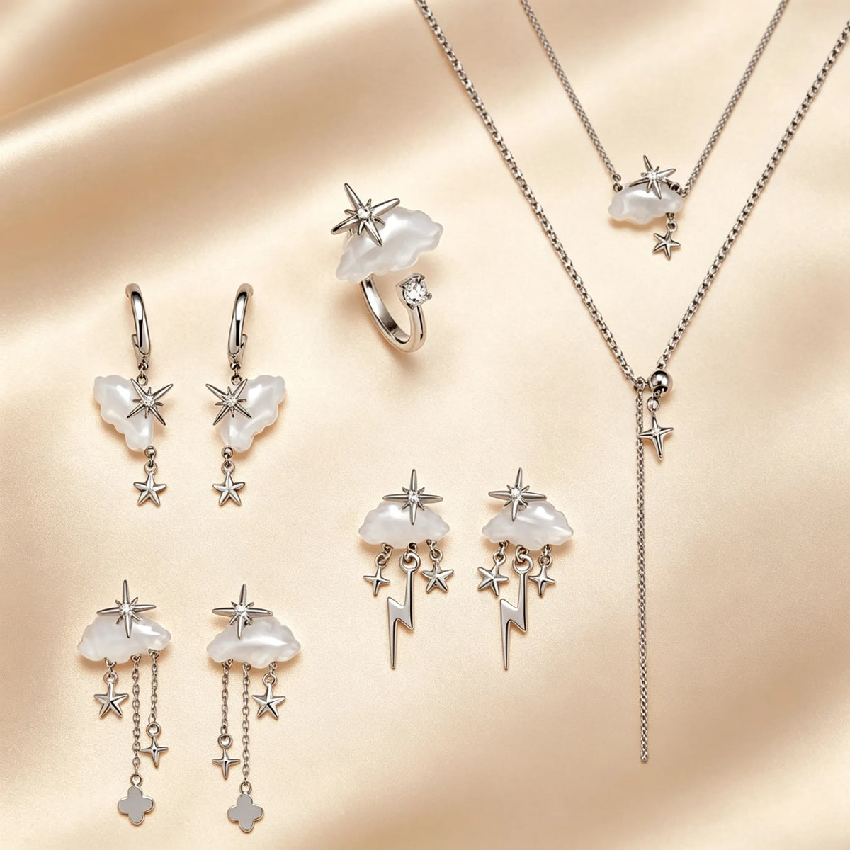 Cloud and star jewellery set with mother-of-pearl clouds, silver ring, layered necklace and three pairs of earrings