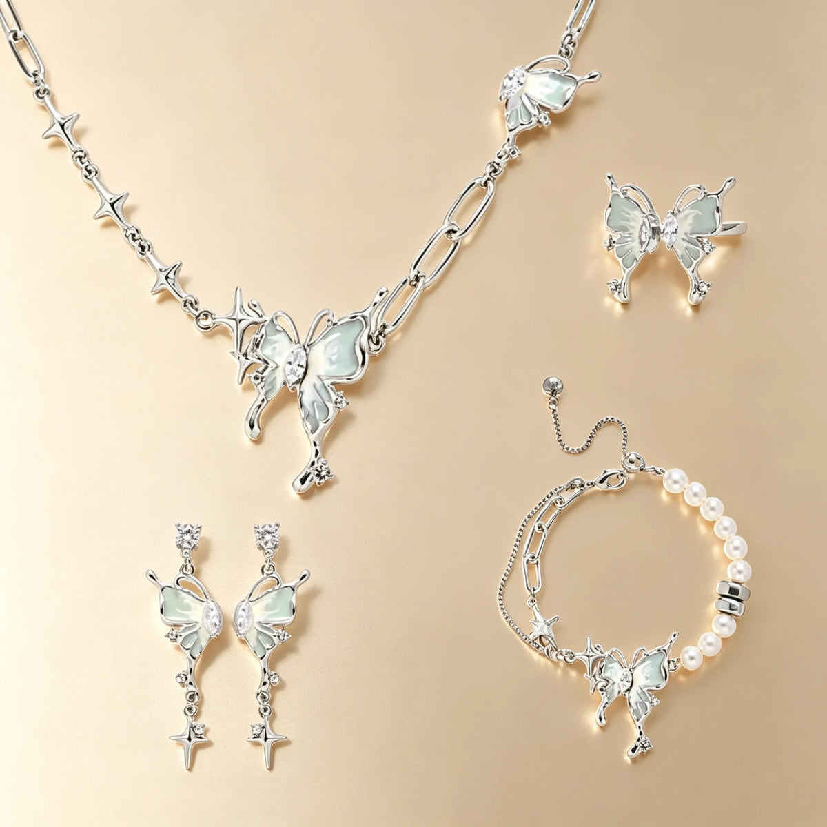 Mint enamel butterfly jewellery set with necklace, ring, drop earrings and pearl bracelet