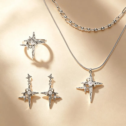 Grunge four-point star jewellery set with pearl accents, silver ring, drop earrings and layered chain necklace