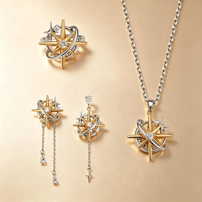 Two-tone starburst jewellery set with gold star and silver ring, asymmetric chain drop earrings and pendant necklace