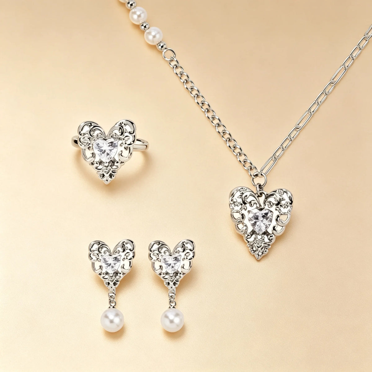 Vintage lace heart jewellery set with filigree silver hearts, clear crystals, pearl drop earrings and ring