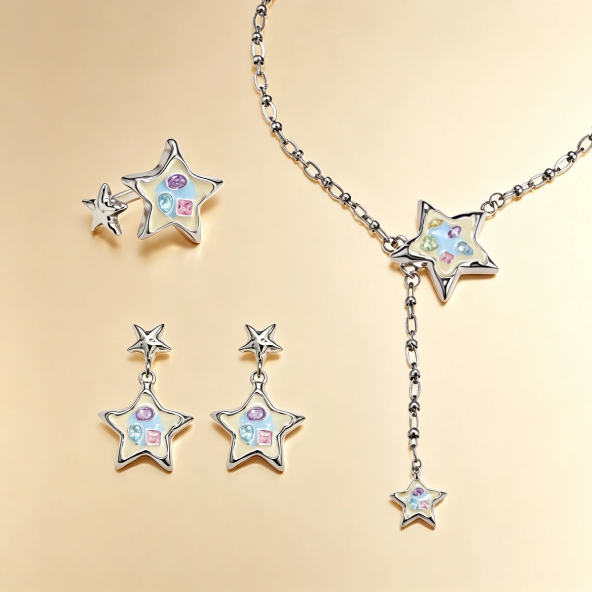 Enamel star jewellery set with pastel crystals, silver ring, star drop earrings and chain lariat necklace